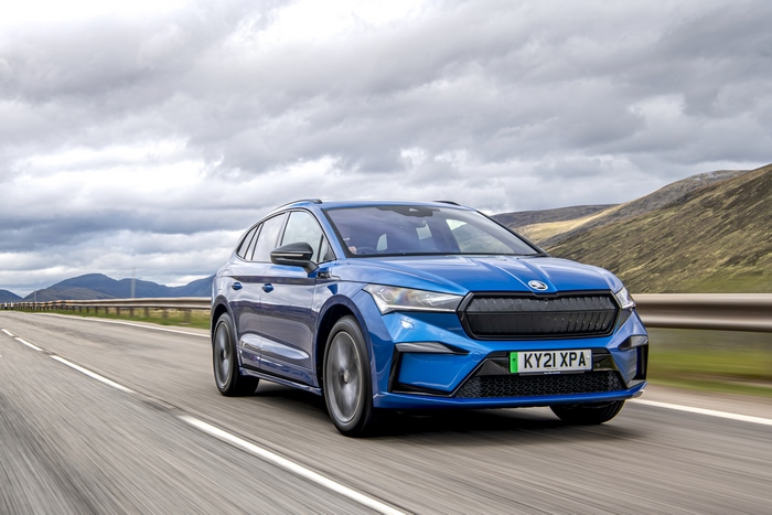 Blue Škoda Enyaq Sportline iV 80 Electric SUV on highway
