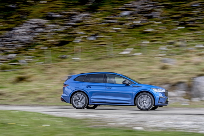Blue Škoda Enyaq Sportline iV 80 electric SUV driving