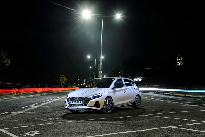 White Hyundai i20 N Line at night with light trails