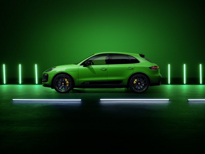 Green Porsche Macan GTS SUV with neon lights