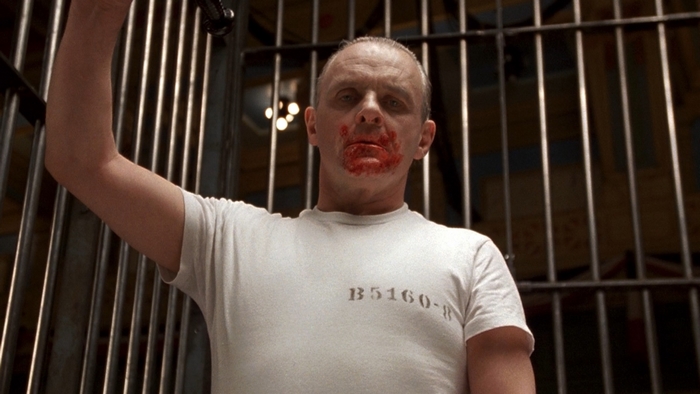 Bloodied Hannibal Lecter behind bars