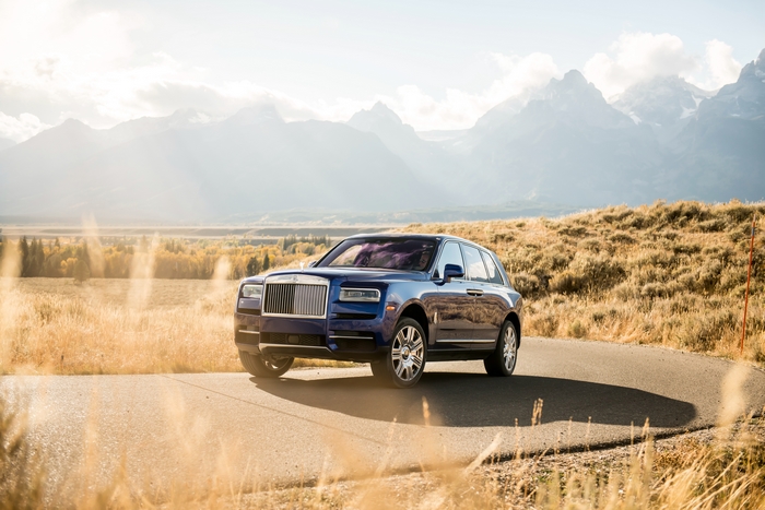 Blue Rolls-Royce Cullinan SUV in Mountain Landscape