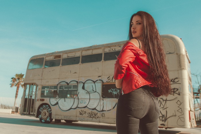 Brunette Model with Long Hair in Red Jacket