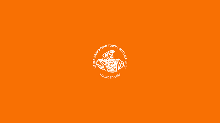 Hemel Hempstead Town F.C. Logo on Orange Background
