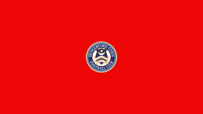 Hungerford Town F.C. logo on red striped background