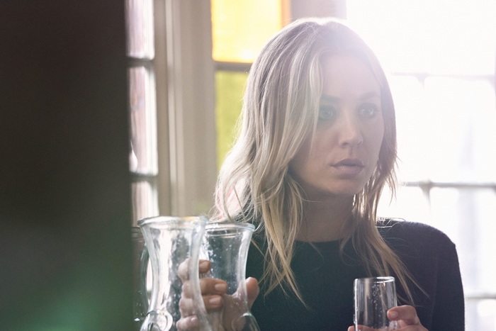 Kaley Cuoco looking pensive in The Flight Attendant