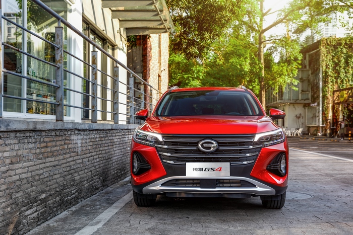 Front view of a red Trumpchi GS4 SUV parked outdoors