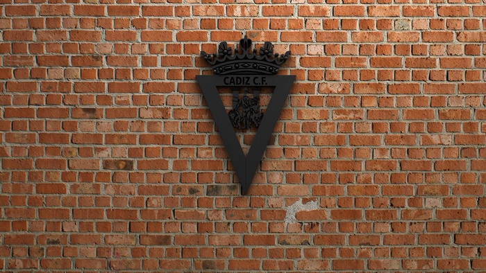 Cádiz CF Soccer Logo on Brick Wall