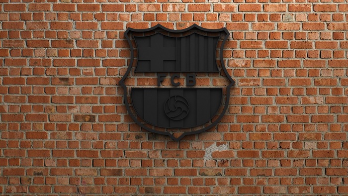 Embossed FC Barcelona Logo on Brick Wall