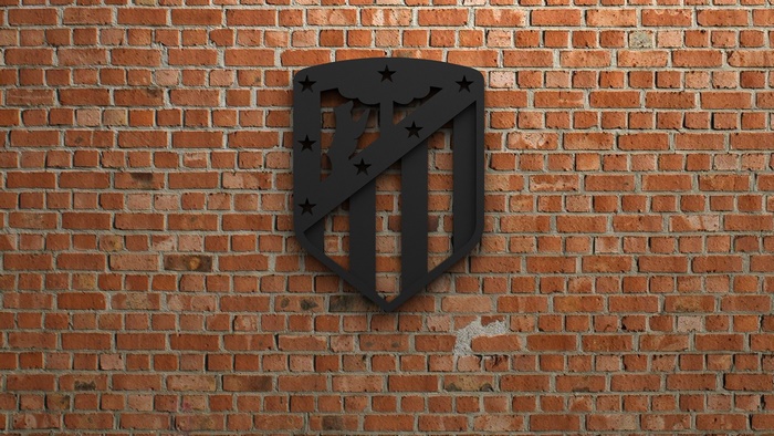 Atlético Madrid Emblem on Brick Wall