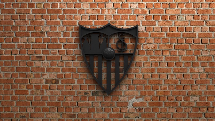 Sevilla FC Emblem on Brick Wall
