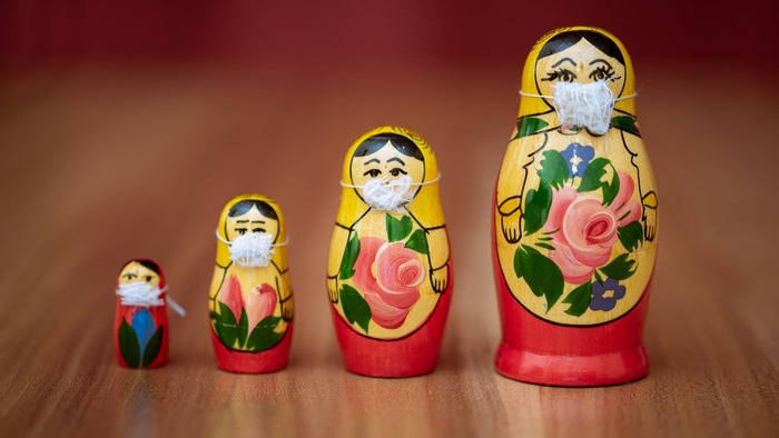 Four Matryoshka Dolls Wearing Face Masks