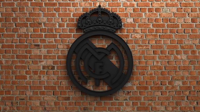 Real Madrid C.F. Black Logo on Brick Wall
