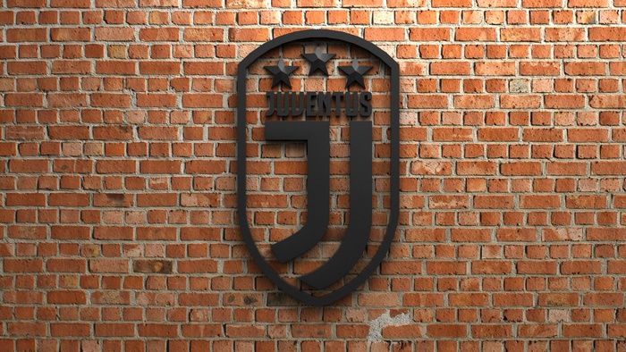 Juventus F.C. soccer emblem on brick wall