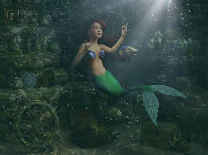 Ariel and Flounder in their underwater grotto