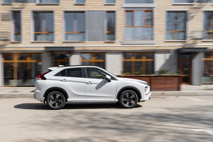 Mitsubishi Eclipse Cross SUV driving with motion blur