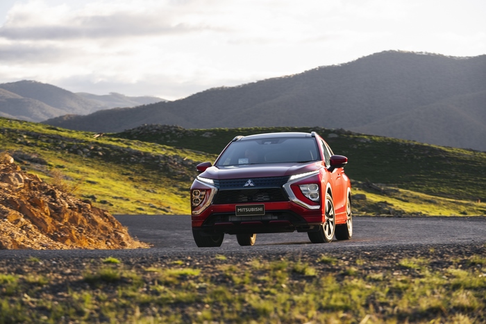 Mitsubishi Eclipse Cross 4K SUV on a scenic road