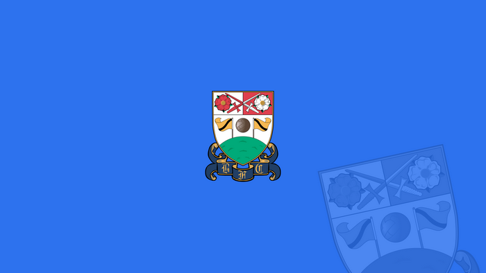 Barnet F.C. Soccer Emblem on Blue Background