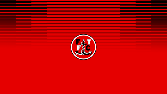 Fleetwood Town F.C. Soccer Logo on Red Striped Background