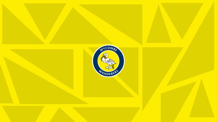 Wycombe Wanderers F.C. Logo on Yellow Geometric Background