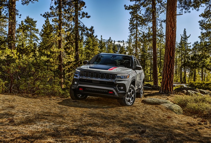 2022 Jeep Compass Trailhawk SUV in a sunny forest