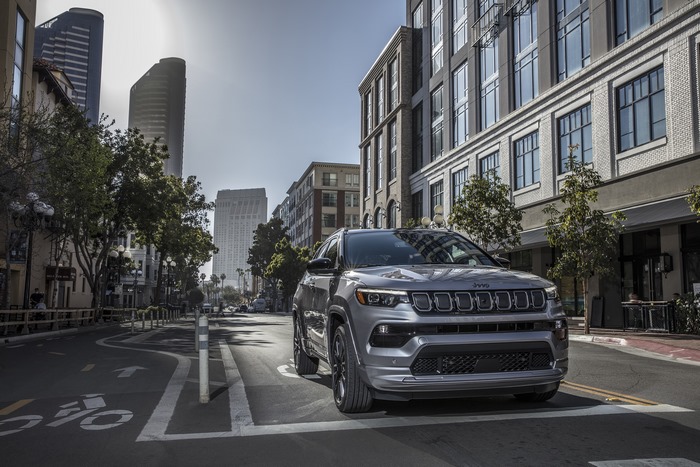 Silver 2022 Jeep Compass High Altitude SUV on city street