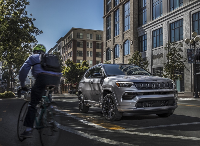 Silver 2022 Jeep Compass High Altitude SUV on city street