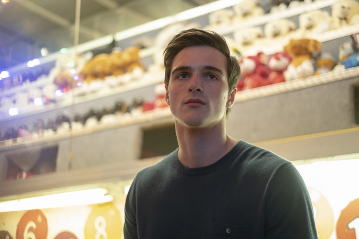 Jacob Elordi in Euphoria looking serious at arcade