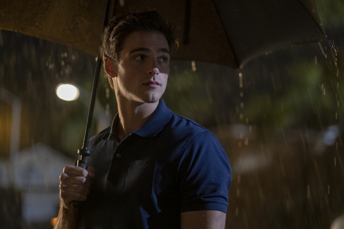 Jacob Elordi in Euphoria holding an umbrella in the rain