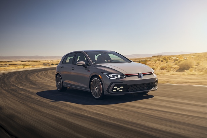 2022 Volkswagen Golf GTI driving on a desert road