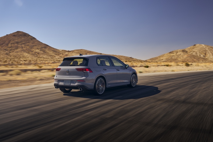 2022 Volkswagen Golf GTI driving in desert mountains