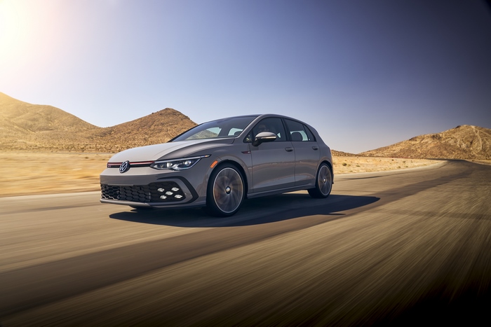 2022 Volkswagen Golf GTI driving on a desert road