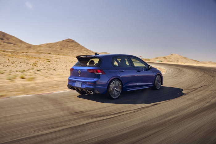 Blue 2022 Volkswagen Golf R on desert track