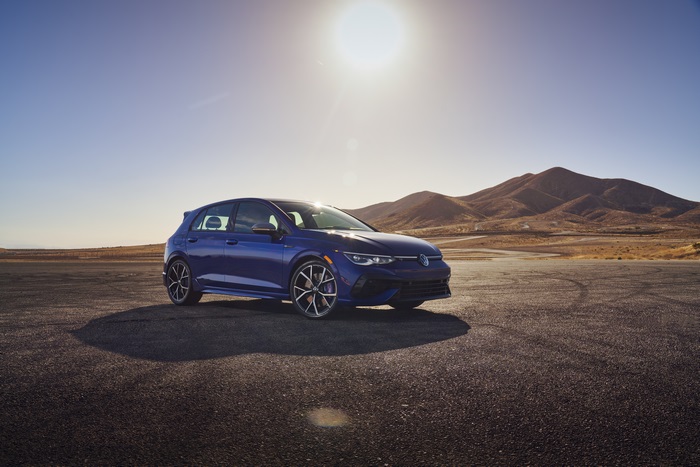 Blue 2022 Volkswagen Golf R in desert landscape