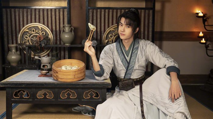 Wang Yibo enjoying dumplings in traditional setting