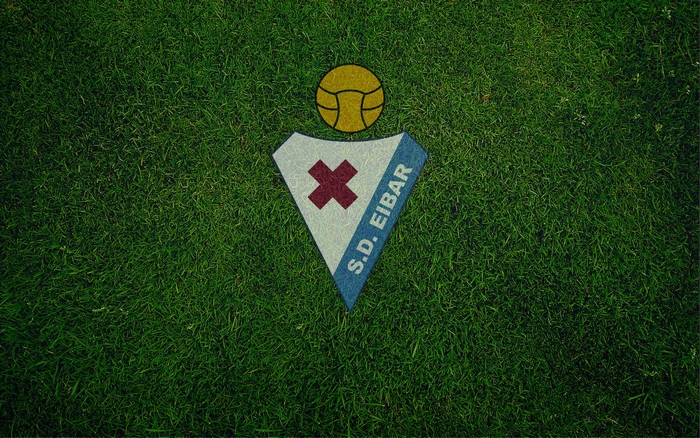SD Eibar Emblem on Green Grass