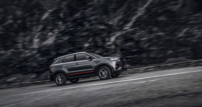 Changan CS55 Plus SUV driving dynamically on road