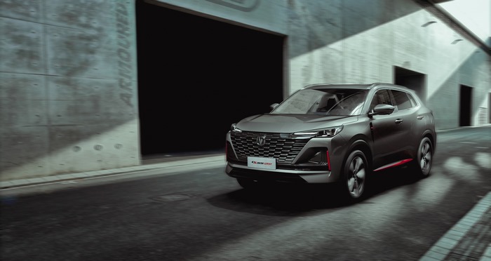 Changan CS55 Plus SUV driving through urban street