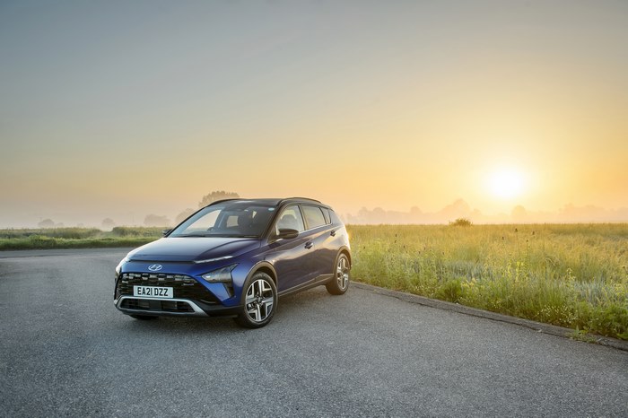 Blue 2021 Hyundai Bayon SUV at sunrise
