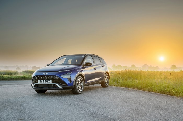 Blue 2021 Hyundai Bayon SUV at sunrise