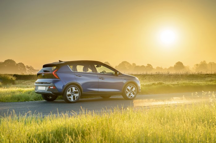 Blue 2021 Hyundai Bayon SUV in golden morning light