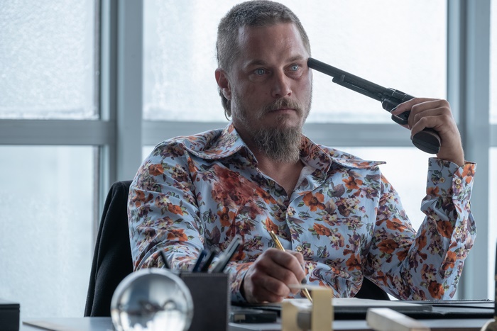 Travis Fimmel in Die In A Gunfight with a gun