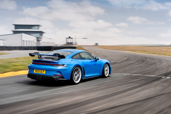 Blue 2021 Porsche 911 GT3 MT on Race Track