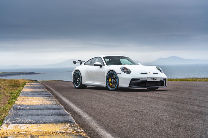 White 2021 Porsche 911 GT3 PDK on coastal road