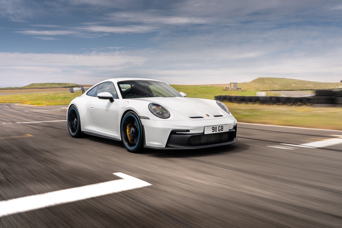 White Porsche 911 GT3 on a race track