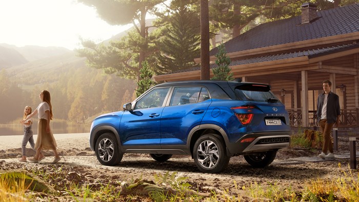 Blue 2021 Hyundai Creta SUV parked near a cabin