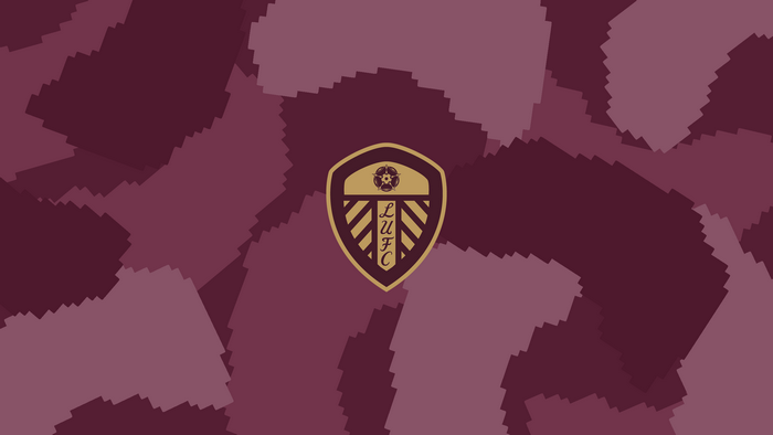Leeds United F.C. emblem on abstract burgundy background