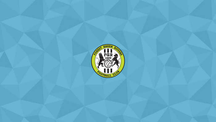 Forest Green Rovers F.C. logo on a blue geometric background