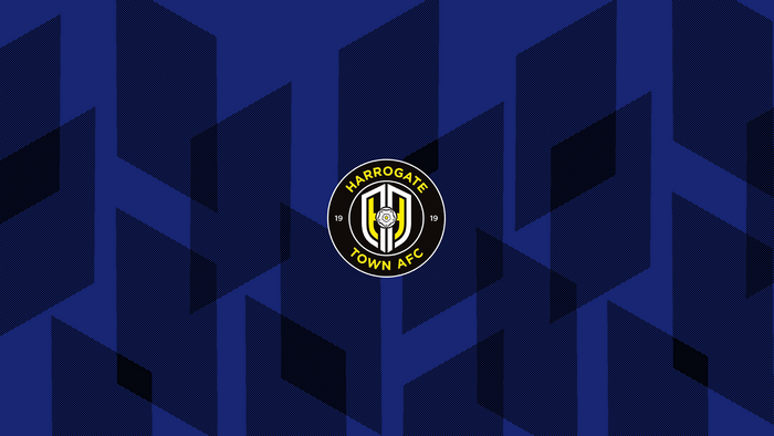 Harrogate Town AFC logo on a blue geometric background