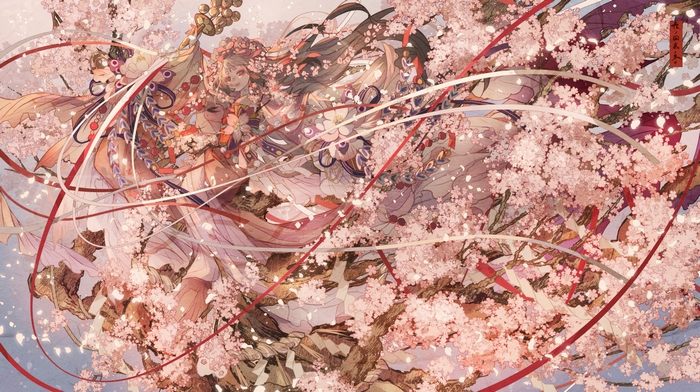 Girl with long hair among cherry blossoms